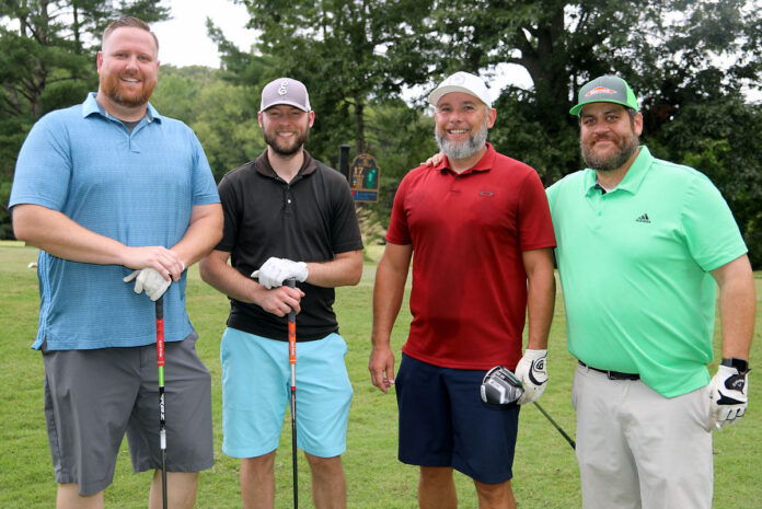 Adam McNamara, Tim Combs, Larry Friend and Ryan Millard at the NAIFA Golf Tournament