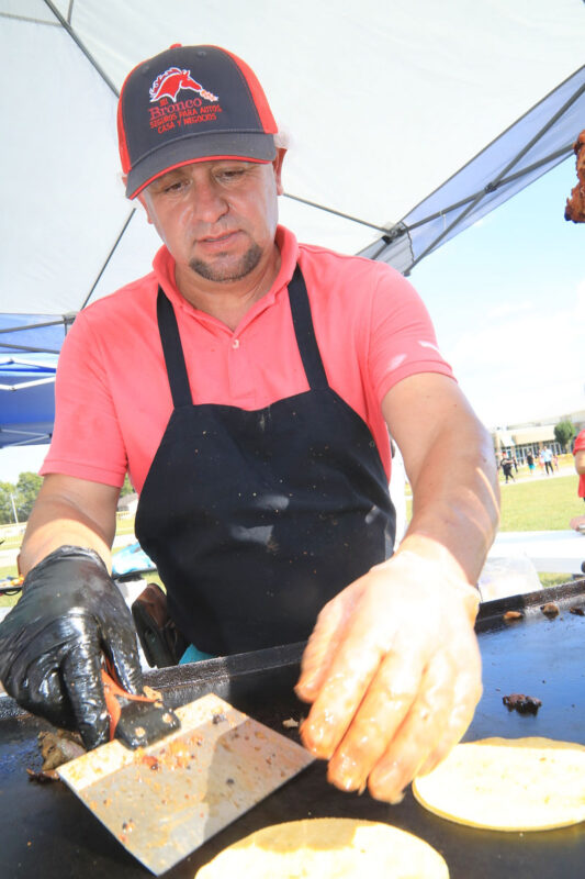 Chuy working the grill Chuy working the grill