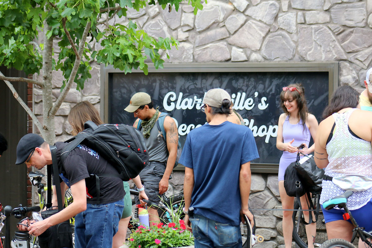 Bicycle riders prepare to leave & Vinyl and head to the new location on the Tour’s list Bicycle riders prepare to leave & Vinyl and head to the new location on the Tour’s list
