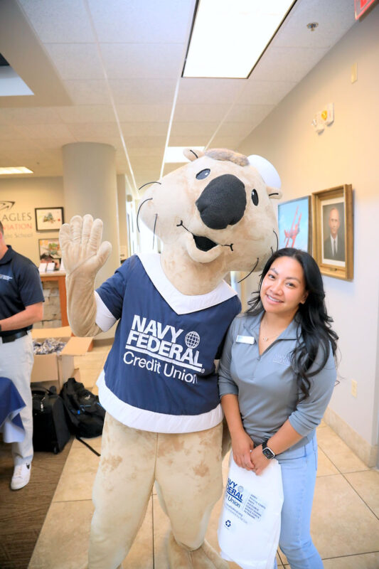 Navy Federal Credit Union’s Sammie the Sea otter with Maria Marzan Navy Federal Credit Union’s Sammie the Sea otter with Maria Marzan