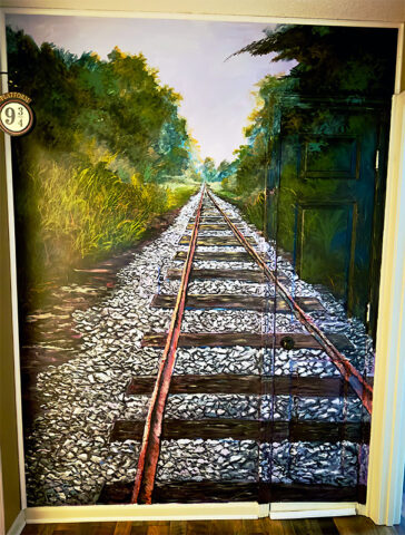 Alfred Thune railroad track hallway mural