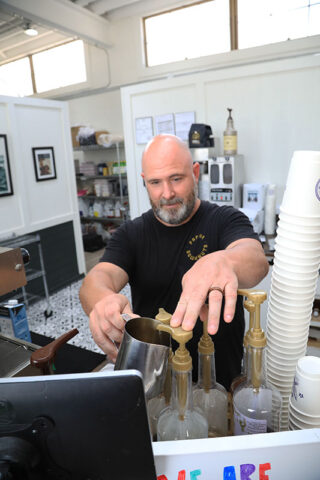 Chris Block, Parlor Doughnuts Director of Operations making coffee