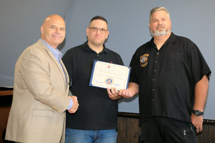Commissioner Tommy Baker, Jarrod Stover and Kevin Slade