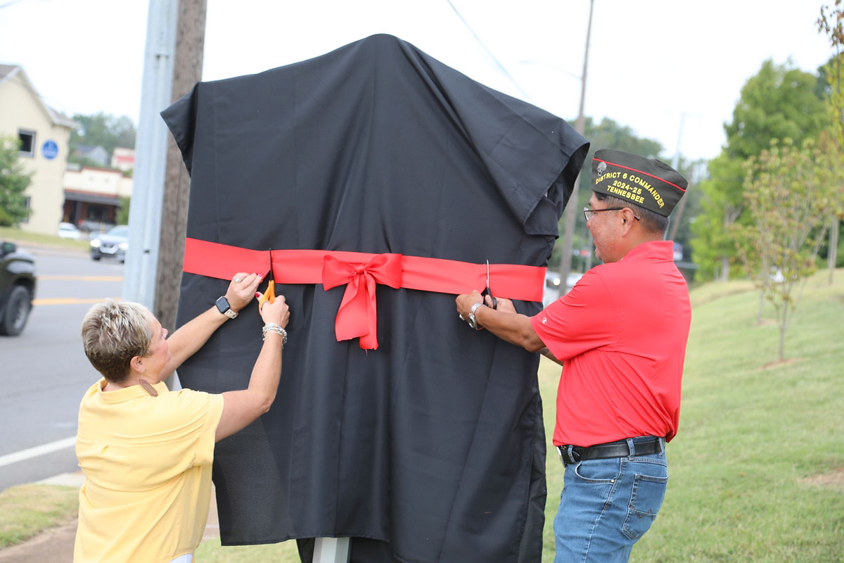 Erin Hedrick and Van Canuto unveil a Tennessee Historical Marker honoring Howard Smiley Johnson Erin Hedrick and Van Canuto unveil a Tennessee Historical Marker honoring Howard Smiley Johnson