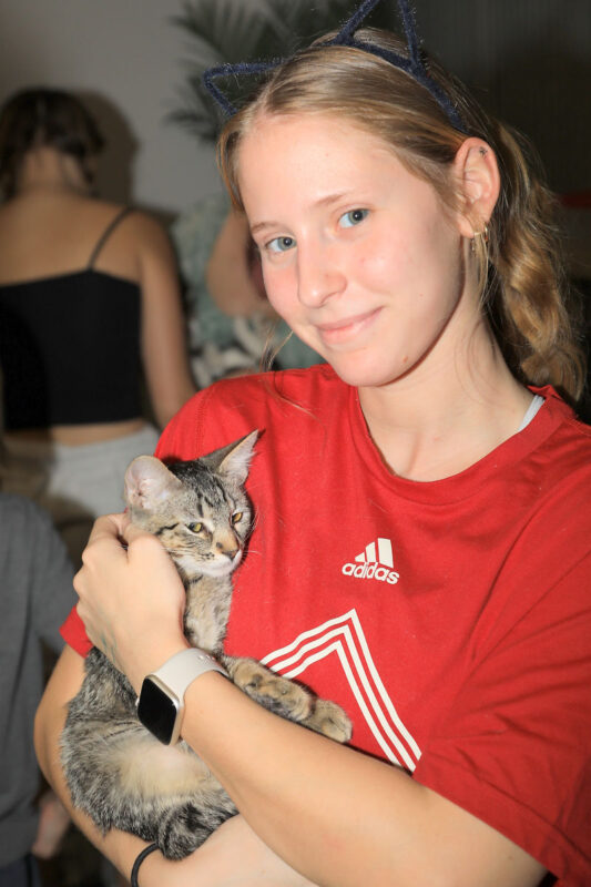 Genevieve LaPierre and one of the kitties up for adoption Genevieve LaPierre and one of the kitties up for adoption