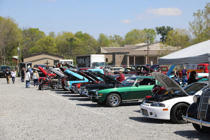 Folks having fun and helping out at a recent Clarksville Cruisers Car Show that benefited YaiPak. (Clarksville Living Magazine, Tony Centonze)