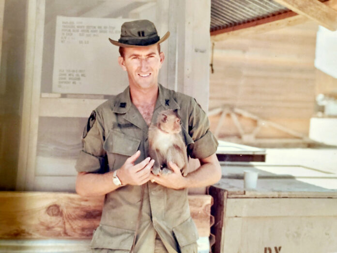 Captain Mauldin at rest in Charlie Hunter Company