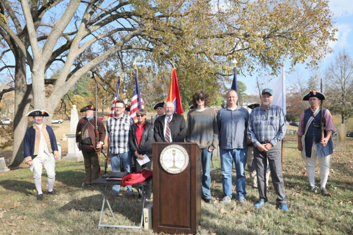 Descendants of Valentine Sevier stand with the Valentine Sevier Chapter, SAR Color Guard