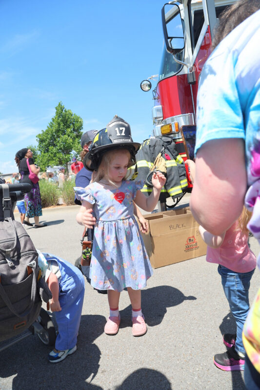 Evelyn Zander stopped by Clarksville Fire Rescue to try on a firefighter's helmet Evelyn Zander stopped by Clarksville Fire Rescue to try on a firefighter's helmet
