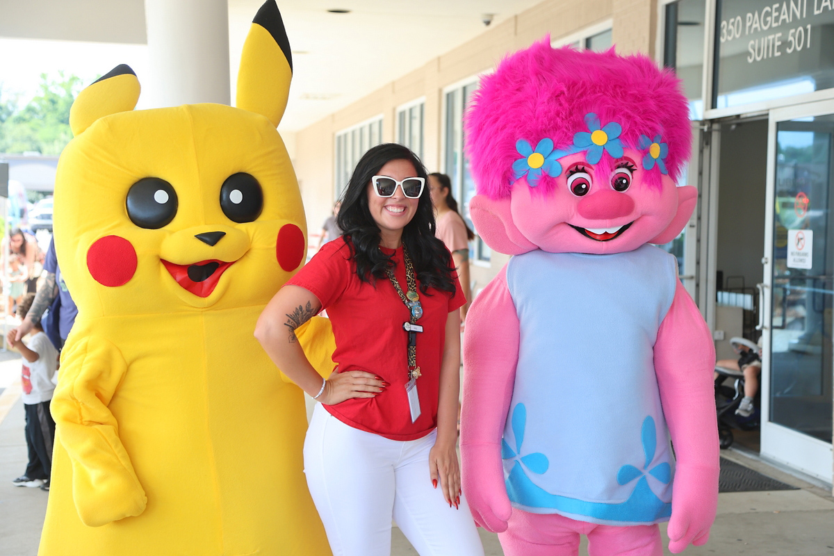 Jess Thomas with Pikachoo and Poppi from Trolls Jess Thomas with Pikachoo and Poppi from Trolls